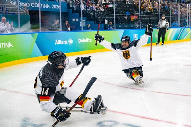 Para Ice hockey, Eishockey - Millano Cortina 2026 Winter Paralympics: Day 4 Para Ice Hockey - Milano Cortina 2026 Winter Paralympics: Day 4 MILANO SANTAGIULIA ICE HOCKEY ARENA BUSSMANN Jano (No. 14, Athlet, Forward, 09.03.2007, Club Wiehl Penguins) scores the first goal for team Germany. WEDDE Joerg (No. 77, Athlet, Forward, 18.08.1965, Club Hannover Ice Lions) is happy about the success of his young teammate. MILANO, ITALY - MARCH 10: Preliminary Round - Group A Italy - Germany Impressions of Team Para Ice Hockey Germany playing Team ITA at March 10 at the Milano Cortina 2026 Winter Paralympics Para Ice Hockey Tournament in the Milano Santagiulia Ice Hockey Arena at day 4. (Photo by RALF KUCKUCK) Copyright 2026 Ralf Kuckuck