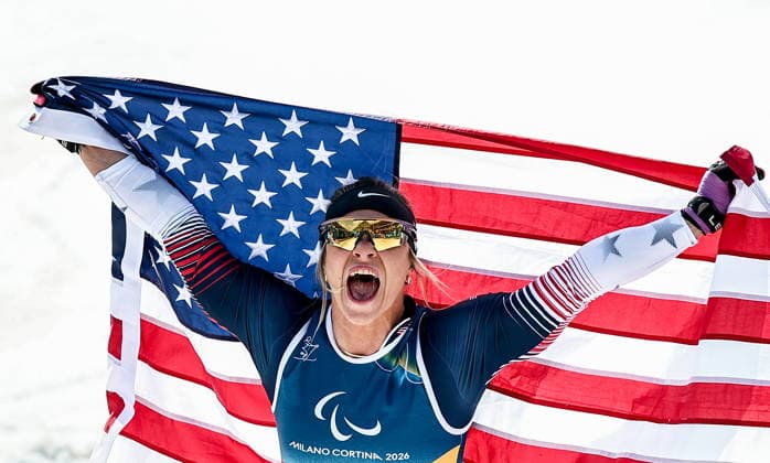 ITALY, TESERO - MARCH 10, 2026: Oksana Masters of the USA celebrates winning a women s para cross-country skiing sitting sprint final at Tesero Cross-Country Stadium during the 2026 Winter Paralympic Games. Mikhail Tereshchenko TASS  89846938