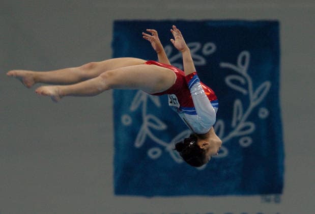 8-15 Karl Mondon Contra Costa Times Gymnastics Artistic Women s Qualification Olympic Indoor Hall Athens, Greece...Kyung Ah Park of Korea competes on the Beam during Sunday s qualifications. .. Copyright: xKarlxMondonx