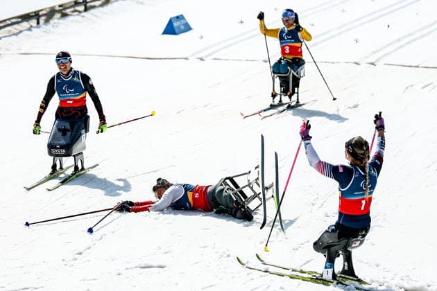 ITALY, TESERO - MARCH 10, 2026: Wang of China, Oksana Masters of the USA, and Aline dos Santos Rocha of Brazil finish a women s para cross-country skiing sitting sprint final at Tesero Cross-Country Stadium during the 2026 Winter Paralympic Games 2026 Winter Paralympics: Para Cross-Country Skiing  - ZUMAt113 20260310_zaa_t113_149 Copyright: xMikhailxTereshchenkox