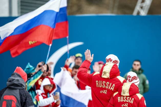 ITALY, TESERO - MARCH 10, 2026: Gold medalists Anastasia Bagiian of Russia and her guide Sergei Siniakin (R-L) attend the victory ceremony for the women s para cross-country skiing classic vision impaired sprint event at Tesero Cross-Country Stadium during the 2026 Winter Paralympic Games 2026 Winter Paralympics: Para Cross-Country Skiing  - ZUMAt113 20260310_zaa_t113_249 Copyright: xMikhailxTereshchenkox