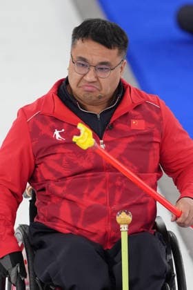 (260310) -- CORTINA D AMPEZZO, March 10, 2026 -- Wang Haitao of China reacts during the wheelchair curling mixed team round robin session 7 match between China and Canada at the Milan-Cortina 2026 Paralympic Winter games, Winterspiele,Spiele, Summer games in Cortina D ampezzo, Italy, March 10, 2026. ) (SP)ITALY-CORTINA D AMPEZZO-PARALYMPIC WINTER GAMES-WHEELCHAIR CURLING-MIXED TEAM-ROUND ROBIN-CHN VS CAN CaixYang 