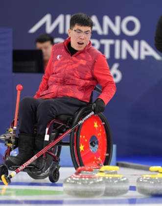 (260310) -- CORTINA D AMPEZZO, March 10, 2026 -- Chen Jianxin of China reacts during the wheelchair curling mixed team round robin session 7 match between China and Canada at the Milan-Cortina 2026 Paralympic Winter games, Winterspiele,Spiele, Summer games in Cortina D ampezzo, Italy, March 10, 2026. ) (SP)ITALY-CORTINA D AMPEZZO-PARALYMPIC WINTER GAMES-WHEELCHAIR CURLING-MIXED TEAM-ROUND ROBIN-CHN VS CAN CaixYang 