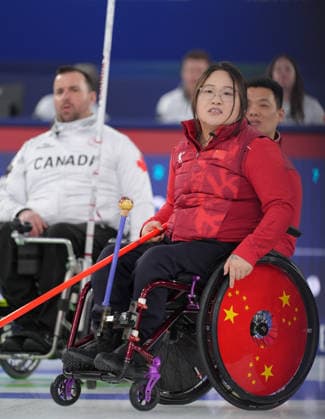 (260310) -- CORTINA D AMPEZZO, March 10, 2026 -- Li Nana (front R) of China reacts during the wheelchair curling mixed team round robin session 7 match between China and Canada at the Milan-Cortina 2026 Paralympic Winter games, Winterspiele,Spiele, Summer games in Cortina D ampezzo, Italy, March 10, 2026. ) (SP)ITALY-CORTINA D AMPEZZO-PARALYMPIC WINTER GAMES-WHEELCHAIR CURLING-MIXED TEAM-ROUND ROBIN-CHN VS CAN CaixYang 