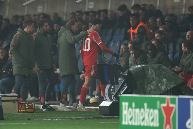 Bergamo, Italy, 10th March 2026. Jamal Musiala of Bayern Munchen is accompanied to the bench after pulling up late on in the Atalanta vs Bayern Munich UEFA Champions League match at Gewiss Stadium, Bergamo. Picture credit should read: Jonathan Moscrop Sportimage EDITORIAL USE ONLY. No use with unauthorised audio, video, data, fixture lists, club league logos or live services. Online in-match use limited to 120 images, no video emulation. No use in betting, games or single club league player publications. SPI_051_ATALANTA_BAYERN_UCL SPI-4583-0055