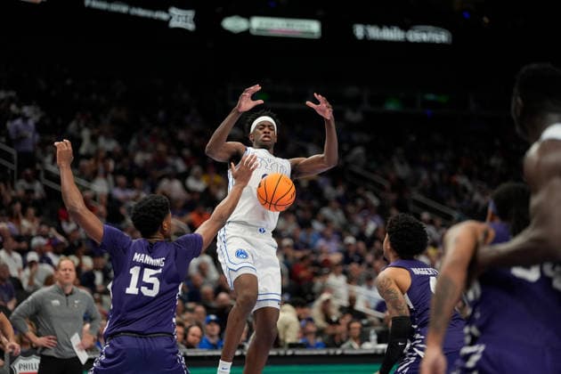 MAR 10 2026: BYU Cougars forward AJ Dybantsa (3) looses control of the ball as he tries to shoot against Kansas State Wildcats forward Taj Manning (15) in the Big 12 Championship Tournament at T-Mobile center, Kansas City, Missouri. CSM. NCAA, College League, USA Basketball 2026: Kansas State Vs BYU Big 12 Tournament  - ZUMAc04_ 20260310_zma_c04_121 Copyright: xJonxRobichaudx