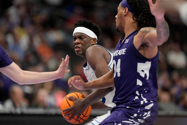 MAR 10 2026: BYU Cougars forward AJ Dybantsa (3) drives against Kansas State Wildcats guard Nate Johnson (34) in the Big 12 Championship Tournament at T-Mobile center, Kansas City, Missouri. CSM. NCAA, College League, USA Basketball 2026: Kansas State Vs BYU Big 12 Tournament  - ZUMAc04_ 20260310_zma_c04_122 Copyright: xJonxRobichaudx