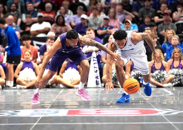 MAR 10 2026: Kansas State Wildcats guard David Castillo (10) dives for a loose ball against BYU Cougars forward Dominique Diomande (24) in the Big 12 Championship Tournament at T-Mobile center, Kansas City, Missouri. CSM. NCAA, College League, USA Basketball 2026: Kansas State Vs BYU Big 12 Tournament  - ZUMAc04_ 20260310_zma_c04_124 Copyright: xJonxRobichaudx