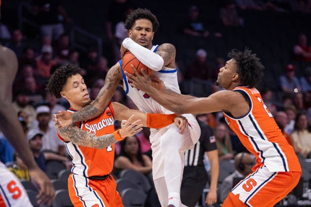 March 10, 2026: SMU Mustangs forward Corey Washington (3) drives between Syracuse Orange guard Nate Kingz (4) and guard JJ Starling (2) during the second half of the 2025 ACC Men s Baskeetball Championship at Spectrum Center in Charlotte, NC. ( ) Charlotte United States - ZUMAc04_ 20260310_zma_c04_163 Copyright: xScottxKinserx