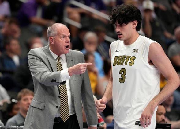 MAR 10 2026: CU coach Tad Boyle give instructions to Colorado Buffaloes forward Alon Michaeli (3) against OSU in the Big 12 Championship Tournament at T-Mobile center, Kansas City, Missouri. CSM. Kansas City United States - ZUMAc04_ 20260310_zma_c04_210 Copyright: xJonxRobichaudx