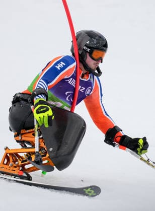 (260311) -- CORTINA D AMPEZZO, March 11, 2026 -- Jeroen Kampschreur of the Netherlands competes during the Para Alpine Skiing Men s Alpine Combined Sitting event at the Milan-Cortina 2026 Paralympic Winter games, Winterspiele,Spiele, Summer games in Cortina D ampezzo, Italy, March 10, 2026. ) (SP)ITALY-CORTINA D AMPEZZO-PARALYMPIC WINTER GAMES-PARA ALPINE SKIING-MEN S ALPINE COMBINED-SITTING WangxKaiyan 