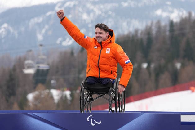 (260311) -- CORTINA D AMPEZZO, March 11, 2026 -- Gold medalist Jeroen Kampschreur of the Netherlands celebrates during the awarding ceremony for the Para Alpine Skiing Men s Alpine Combined Sitting event at the Milan-Cortina 2026 Paralympic Winter games, Winterspiele,Spiele, Summer games in Cortina D ampezzo, Italy, March 10, 2026. ) (SP)ITALY-CORTINA D AMPEZZO-PARALYMPIC WINTER GAMES-PARA ALPINE SKIING-MEN S ALPINE COMBINED-SITTING LianxYi 