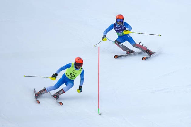 (260311) -- CORTINA D AMPEZZO, March 11, 2026 -- Giacomo Bertagnolli (R) and his guide Andrea Ravelli of Italy compete during the Para Alpine Skiing Men s Alpine Combined Vision Impaired event at the Milan-Cortina 2026 Paralympic Winter games, Winterspiele,Spiele, Summer games in Cortina D ampezzo, Italy, March 10, 2026. ) (SP)ITALY-CORTINA D AMPEZZO-PARALYMPIC WINTER GAMES-PARA ALPINE SKIING-MEN S ALPINE COMBINED-VISION IMPAIRED LianxYi 