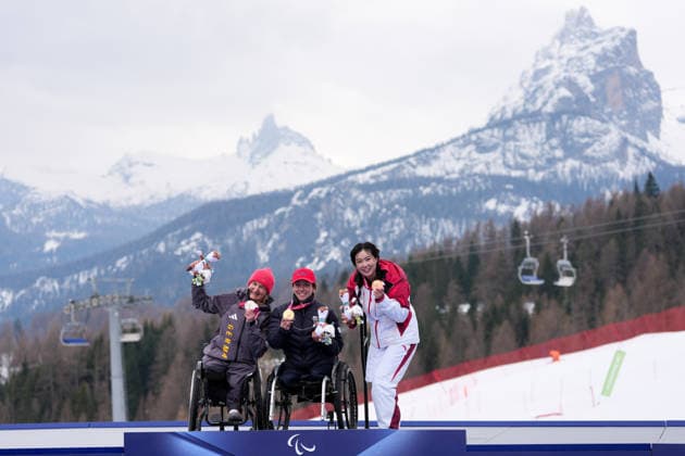 (260311) -- CORTINA D AMPEZZO, March 11, 2026 -- Gold medalist Audrey Pascual Seco (C) of Spain, silver medalist Anna-Lena Forster (L) of Germany, and bronze medalist Liu Sitong of China pose on the podium during the awarding ceremony for the para alpine skiing women s combined sitting event at the Milan-Cortina 2026 Paralympic Winter games, Winterspiele,Spiele, Summer games in Cortina D ampezzo, Italy, March 10, 2026. ) (SP)ITALY-CORTINA D AMPEZZO-PARALYMPIC WINTER GAMES-PARA ALPINE SKIING-WOMEN S COMBINED-SITTING LianxYi 