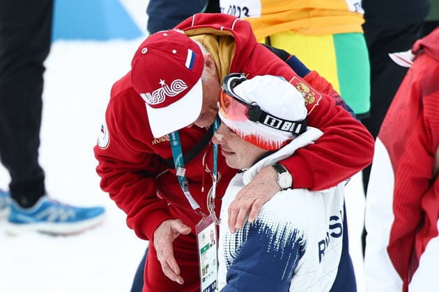 ITALY, TESERO - MARCH 11, 2026: Ivan Golubkov of Russia and President of the Russian Paralympic Committee Pavel Rozhkov are seen after the men s para cross-country skiing 10km interval start sitting final at Tesero Cross-Country Stadium during the 2026 Winter Paralympic Games. Mikhail Tereshchenko TASS  89879046