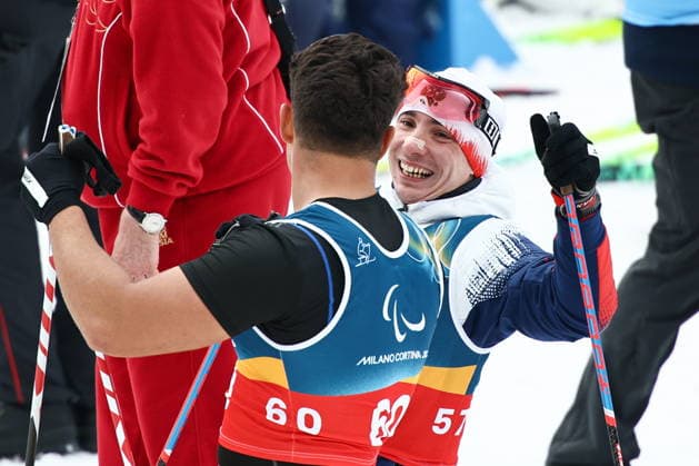 ITALY, TESERO - MARCH 11, 2026: Cristian Westemaier Ribera (L) of Brazil and Ivan Golubkov of Russia are seen after the men s para cross-country skiing 10km interval start sitting final at Tesero Cross-Country Stadium during the 2026 Winter Paralympic Games 2026 Winter Paralympics: Para Cross-Country Skiing  - ZUMAt113 20260311_zaa_t113_089 Copyright: xMikhailxTereshchenkox
