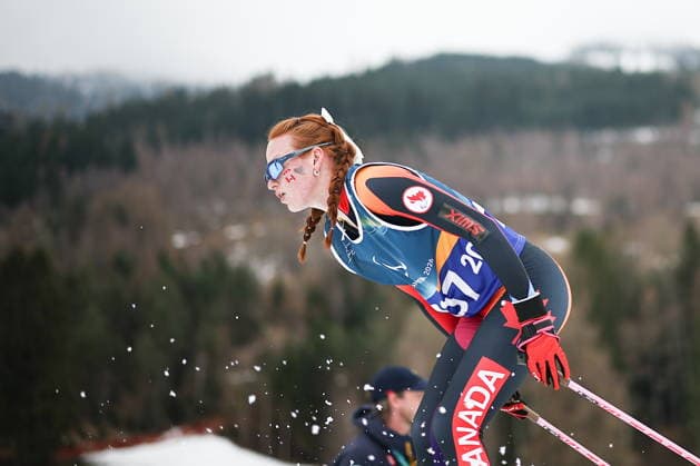 ITALY, TESERO - MARCH 11, 2026: Maddie Mullin of Canada competes in the women s para cross-country skiing 10km interval start classic vision impaired final at Tesero Cross-Country Stadium during the 2026 Winter Paralympic Games. Mikhail Tereshchenko TASS  89883920