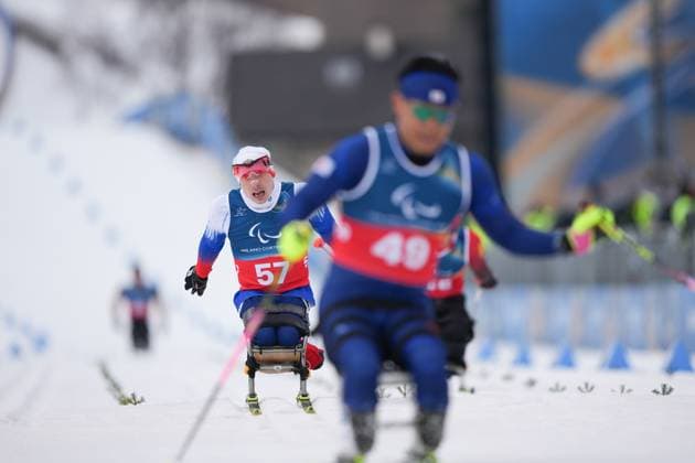 (260311) -- TESERO, March 11, 2026 -- Ivan Golubkov (1st L) of Russia competes during the final match of the men s 10km interval start sitting of Para Cross-Country Skiing at the Milan-Cortina 2026 Paralympic Winter games, Winterspiele,Spiele, Summer games in Tesero, Italy, March 11, 2026. ) (SP)ITALY-TESERO-PARALYMPIC WINTER GAMES-PARA CROSS-COUNTRY-MEN S 10KM INTERVAL START SITTING LianxZhen 