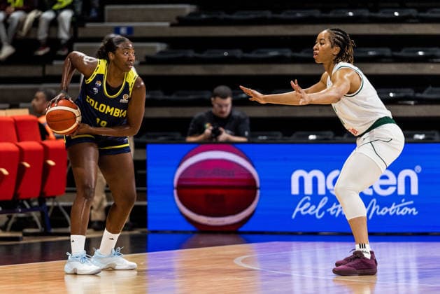 LYON-VILLEURBANNE, FRANCE - MARCH 11: Daniela Gonzalez (Colombia, 19) controls the ball against Pallas Kunaiyi-Akpanah (Nigeria, 3) during the FIBA Women™s World Cup Qualifying Tournament match between Nigeria vs. Colombia at Astroballe on matchday 1 of the FIBA Women™s World Cup Qualifying Tournament on March 11, 2026 in Lyon-Villeurbanne, France. France Copyright: xSteffiexWunderlx