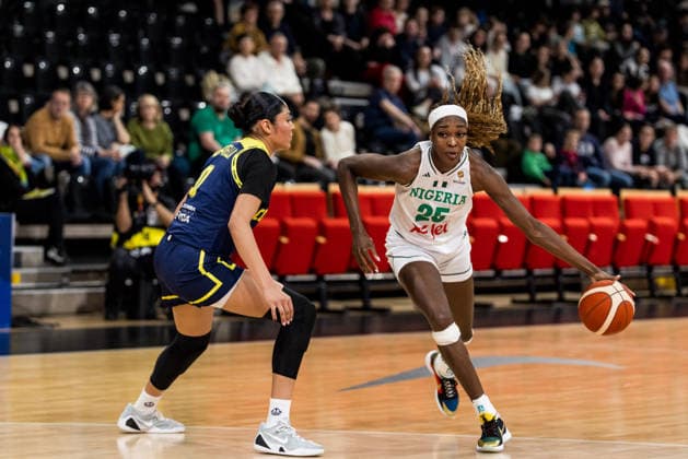 LYON-VILLEURBANNE, FRANCE - MARCH 11: Victoria Macaulay (Nigeria, 25) controls the ball against Marta Moscarella (Colombia, 0) during the FIBA Women™s World Cup Qualifying Tournament match between Nigeria vs. Colombia at Astroballe on matchday 1 of the FIBA Women™s World Cup Qualifying Tournament on March 11, 2026 in Lyon-Villeurbanne, France. France Copyright: xSteffiexWunderlx