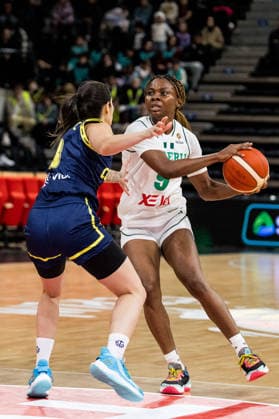 LYON-VILLEURBANNE, FRANCE - MARCH 11: Ifunanya Okoro (Nigeria, 9) controls the ball against Carolina Lopez (Colombia, 8) during the FIBA Women™s World Cup Qualifying Tournament match between Nigeria vs. Colombia at Astroballe on matchday 1 of the FIBA Women™s World Cup Qualifying Tournament on March 11, 2026 in Lyon-Villeurbanne, France. France Copyright: xSteffiexWunderlx