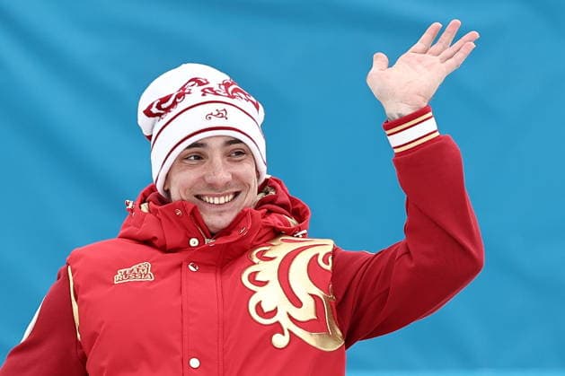 ITALY, TESERO - MARCH 11, 2026: Gold medalist Ivan Golubkov of Russia poses at a victory ceremony for the men s para cross-country skiing 10km interval start sitting at Tesero Cross-Country Stadium during the 2026 Winter Paralympic Games. Mikhail Tereshchenko TASS  89886287