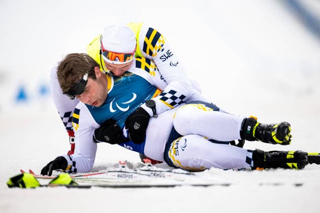 260311 Zebastian Modin of Sweden celebrate with guide Emil Talsi after competing in the men™s 10km interval start vision impaired para cross-country skiing during day 5 of the Milano Cortina 2026 Winter Paralympic Games on March 11, 2026 in Val di Fiemme. Photo: Maxim ThorÃ BILDBYRAN kod MT MT1018 skidor cross-country skiing langrenn paralympic games paralympics paralympiska spel paralympiske leker vinter-paralympics winter paralympics milano cortina 2026 milano cortina 2026 winter paralympic games 5 bbeng jubel sverige *** 260311 Zebastian Modin of Sweden celebrate with guide Emil Talsi after competing in the men™s 10km interval start vision impaired para cross country skiing during day 5 of the Milano Cortina 2026 Winter Paralympic Games on March 11, 2026 in Val di Fiemme Photo Maxim ThorÃ BILDBYRAN kod MT MT1018 skidor cross country skiing langrenn paralympic games paralympiska spel paralympiske leker vinter paralympics winter paralympics milano cortina 2026 milano cortina 2026 winter paralympic games 5 bbeng jubel sverige  Copyright: MAXIMxTHORE BB260311MT109