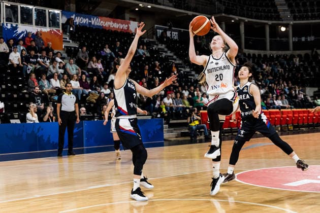 LYON-VILLEURBANNE, FRANCE - MARCH 11: Frieda Buehner (Bühner, Buhner Germany, 20) shoots the ball over Leeseul Kang (Republic of Korea, 3) during the FIBA Women™s World Cup Qualifying Tournament match between Germany vs. Republic of Korea at Astroballe on matchday 1 of the FIBA Women™s World Cup Qualifying Tournament on March 11, 2026 in Lyon-Villeurbanne, France. France Copyright: xSteffiexWunderlx