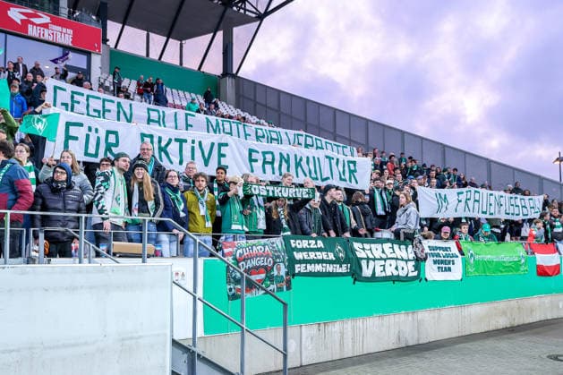 2026.03.11, Fußball, DFB-Pokal Frauen, SGS Essen - SV Werder Bremen, Viertelfinale, Stadion an der Hafenstraße, Damen, Saison 2025 2026: Banner protestbanner in der Fankurve der Ultras Bremen Gegen Alle Materialverbote für Aktive Fankultur im Frauenfußball Schriftzug Zuschauer Gästefans Gästeblock DFB regulations prohibit any use of photographs as image sequences and or quasi-video. Nordrhein-Westfalen Deutschland