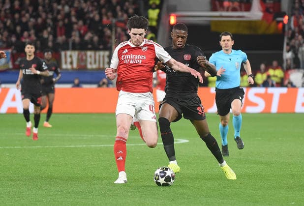 11.03.2026, xhbx, Fussball UEFA Champions League, Bayer 04 Leverkusen - FC Arsenal London v.l. Declan Rice (Arsenal London FC), Christian Kofane (Bayer Leverkusen) (DFL DFB REGULATIONS PROHIBIT ANY USE OF PHOTOGRAPHS as IMAGE SEQUENCES and or QUASI-VIDEO) Leverkusen