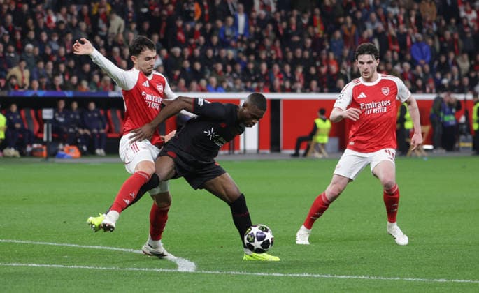 V.l. Martin Zubimendi (Arsenal), Christian Kofane (B04) und Declan Rice (Arsenal), UEFA Champions League, UCL, Achtelfinale, Bayer 04 Leverkusen vs Arsenal London, Bayarena Leverkusen, Deutschland, 11.03.2026.
