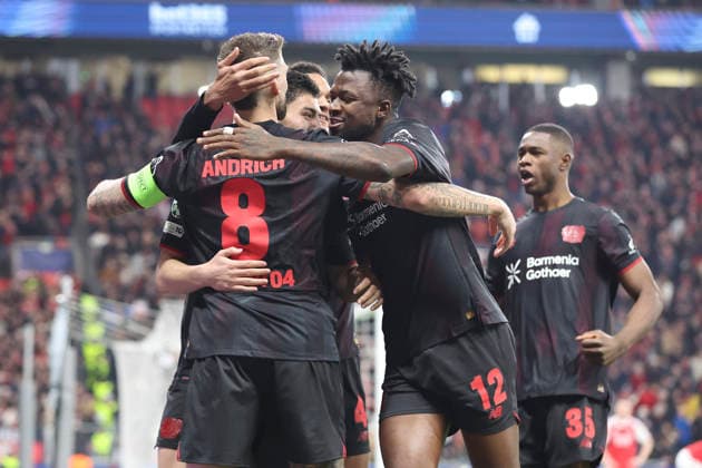 Robert Andrich (Bayer 04 Leverkusen) celebrates after scoring his team s first goal with teammates during the UEFA Champions League 2025 26 Round of 16 First Leg match between Bayer 04 Leverkusen and Arsenal FC at BayArena on March 11, 2026 in Leverkusen, Germany. (Photo by Oliver Kaelke DeFodi Images) -