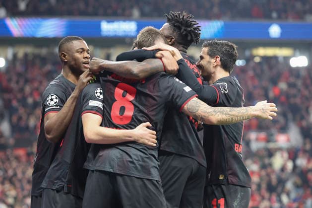 Robert Andrich (Bayer 04 Leverkusen) celebrates after scoring his team s first goal with teammates during the UEFA Champions League 2025 26 Round of 16 First Leg match between Bayer 04 Leverkusen and Arsenal FC at BayArena on March 11, 2026 in Leverkusen, Germany. (Photo by Oliver Kaelke DeFodi Images) -