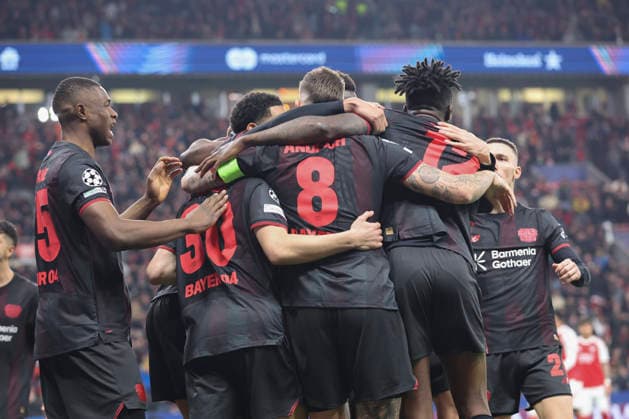 Robert Andrich (Bayer 04 Leverkusen) celebrates after scoring his team s first goal with teammates during the UEFA Champions League 2025 26 Round of 16 First Leg match between Bayer 04 Leverkusen and Arsenal FC at BayArena on March 11, 2026 in Leverkusen, Germany. (Photo by Oliver Kaelke DeFodi Images) -