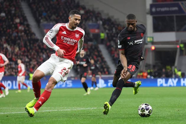 William Saliba (Arsenal FC) und Christian Kofane (Bayer 04 Leverkusen) battle for the ball during the UEFA Champions League 2025 26 Round of 16 First Leg match between Bayer 04 Leverkusen and Arsenal FC at BayArena on March 11, 2026 in Leverkusen, Germany. (Photo by Oliver Kaelke DeFodi Images) -