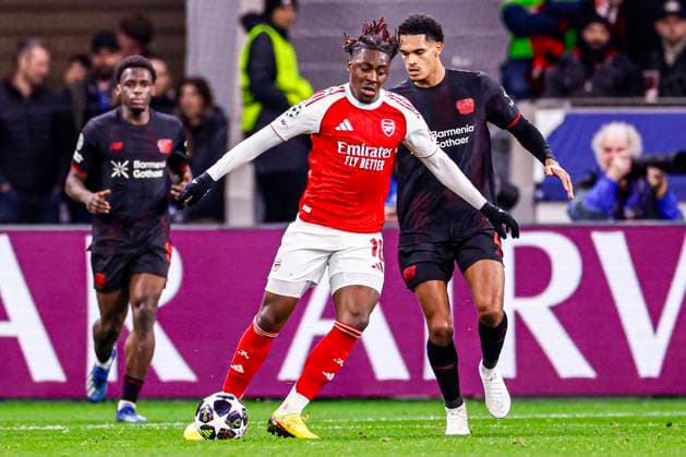 Eberechi Eze of Arsenal FC battles for possession with Jarell Quansah of Bayer 04 Leverkusen Bayer 04 Leverkusen v Arsenal FC, UEFA Champions League 2025 26 Round of 16 First Leg, Bayer 04 Leverkusen v Arsenal FC, BayArena, March 11, 2026, Leverkusen, Germany.
