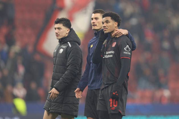 Ibrahim Maza (Bayer 04 Leverkusen), Patrik Schick (Bayer 04 Leverkusen) und Malik Tillmann (Bayer 04 Leverkusen) looks on during the UEFA Champions League 2025 26 Round of 16 First Leg match between Bayer 04 Leverkusen and Arsenal FC at BayArena on March 11, 2026 in Leverkusen, Germany. (Photo by Oliver Kaelke DeFodi Images) -