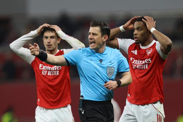 referee Halil Umut Meler gestures during the UEFA Champions League 2025 26 Round of 16 First Leg match between Bayer 04 Leverkusen and Arsenal FC at BayArena on March 11, 2026 in Leverkusen, Germany. (Photo by Oliver Kaelke DeFodi Images) -