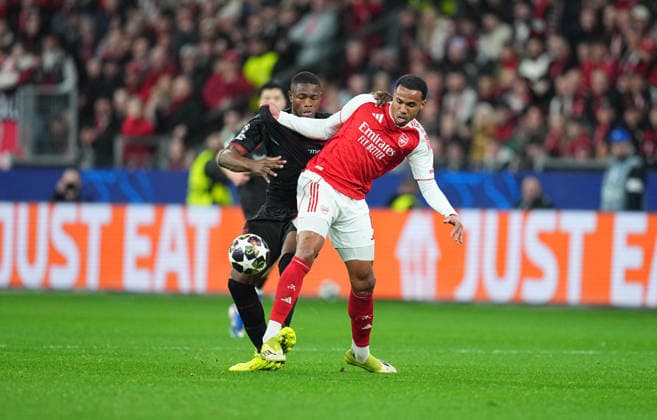 Gabriel Magalhaes (FC Arsenal) and Exequiel Palacios (Bayer 04 Leverkusen) battle for the ball during Bayer Leverkusen and FC Arsenal at BayArena, Leverkusen, Germany on March 11, 2026. Thor Wegner DeFodi Images. (Photo by DeFodi Images) -