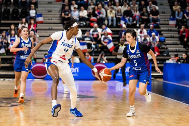 LYON-VILLEURBANNE, FRANCE - MARCH 11: Kent Jane Pastrana (Philippines, 5) tries to control the ball against Dominique Malonga (France, 14) during the FIBA Women™s World Cup Qualifying Tournament match between France (FRA) vs. Philippines (PHI) at Astroballe on matchday 1 of the FIBA Women™s World Cup Qualifying Tournament on March 11, 2026 in Lyon-Villeurbanne, France. France Copyright: xSteffiexWunderlx