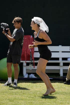 March 11, 2026 Aryna Sabalenka wears a bridal veil that a fan threw to her during a workout at the BNP Paribas Open held at the Indian Wells Tennis Garden in Indian Wells, California. California. Mandatory Photo Credit : CSM Indian Wells United States of America - ZUMAc04_ 20260311_zma_c04_055 Copyright: xCharlesxBausx