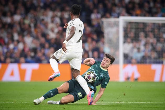REAL MADRID CF v MANCHESTER CITY FC. CHAMPIONS LEAGUE 2025 2026. ROUND OF 16 FIRST LEG. Real Madrid CF s Vinicius Junior (l) and Manchester City FC s Abdukodir Khusanov during Champions League 2025 2026 match. March 11,2026. (ALTERPHOTOS Ropero) MadridSpain  Copyright: xRoperox