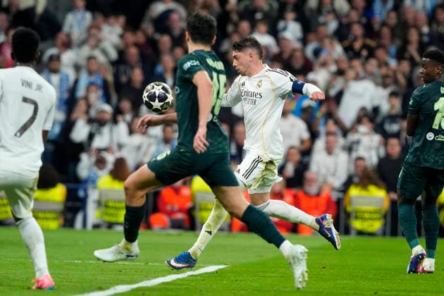 Real Madrid CF s Federico Valverde (r) and Manchester City FC s Abdukodir Khusanov during Champions League 2025 2026, Round of 16 1st leg match. March 11 ,2026. (20260311296)