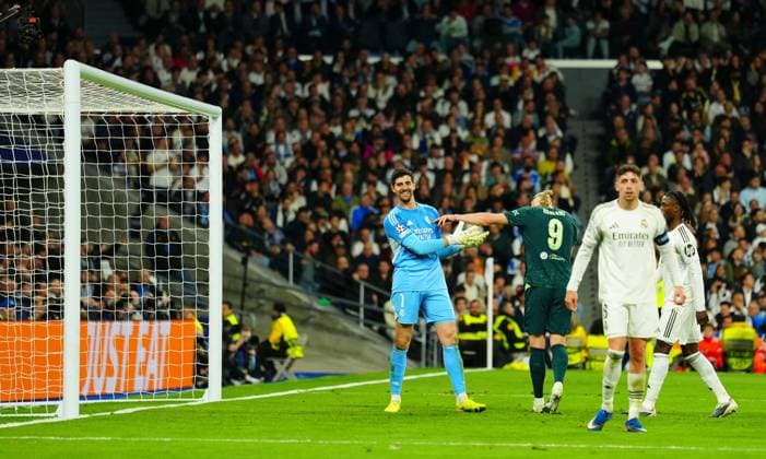 Erling Haaland of Manchester City playfully shoves Real Madrid Goalkeeper Thibaut Courtois after he saved from Nico O Reilly at 3-0 Real Madrid v Manchester City, UEFA Champions League, Round of 16, First Leg, Football, Bernabeu, Madrid, Spain - 11 Mar 2026Madrid Bernabeu Spain EDITORIAL USE ONLY No use with unauthorised audio, video, data, fixture lists, club league logos or live services. Online in-match use limited to 120 images, no video emulation. No use in betting, games or single club league player publications. Copyright: xJavierxGarcia Shutterstockx 16746741aq