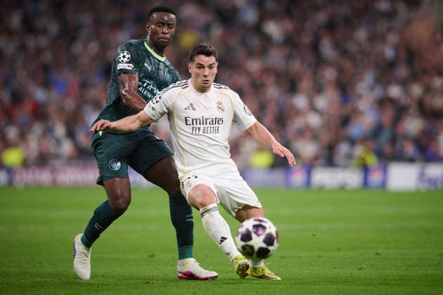 Real Madrid CF s Brahim Diaz (r) and Manchester City FC s Marc Guehi during Champions League 2025 2026 match. March 11,2026. (20260311033)