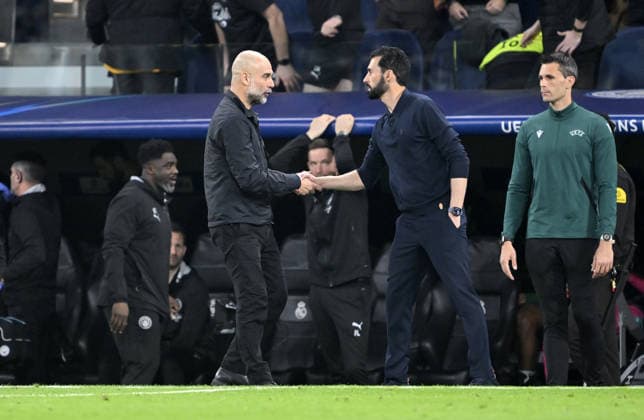 Real Madrid v Manchester City - UEFA Champions League MADRID, SPAIN - MARCH 11: Head coach Alvaro Arbeloa (R) of Real Madrid and head coach Pep Guardiola (L) of Manchester City congratulate each other at the end of the UEFA Champions League round of 16 match between Real Madrid and Manchester City at the Bernabeu Stadium in Madrid, Spain, on March 11, 2026. Burak Akbulut Anadolu Madrid Spain. Editorial use only. Please get in touch for any other usage.  Copyright: x2026xAnadoluxBurakxAkbulutx