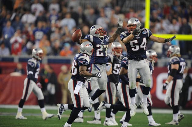 Feb 03, 2008 - Glendale, Arizona, USA - New England Patriots ELLIS HOBBS (27) and TEDDY BRUSCHI celebrate in the second quarter during Super Bowl XLII at University of Phoenix Stadium. The New England Patriots who went unbeaten during their 2007 season faced the New York Giants. Copyright: xKarlxMondonx