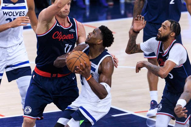 March 11, 2026, Inglewood, California, USA: Brook Lopez 11 and Derrick Jones Jr. 5 of the Los Angeles Clippers defend the basket from Anthony Edwards 5 of the Minnesota Timberwolves during their regular season NBA, Basketball Herren, USA game on Wednesday March 11, 2026 at Intuit Dome in Inglewood, California. ARIANA RUIZ PI Inglewood USA - ZUMAp124 20260311_zaa_p124_079 Copyright: xArianaxRuizx