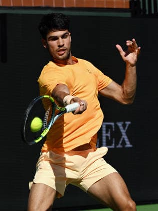 INDIAN WELLS, CA - MARCH 11: Carlos Alcaraz (ESP) returns the ball during an ATP, Tennis Herren tennis match during the BNP Paribas Open played on March 11, 2026 at the Indian Wells Tennis Garden in Indian Wells, CA. (Photo by John Cordes Icon Sportswire) TENNIS: MAR 11 BNP Paribas Open EDITORIAL USE ONLY Icon506260311062