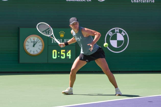 INDIAN WELLS, CA - MARCH 11: Iga Swiatek (POL) hits a forehand during the BNP Paribas Open on March 11, 2026 at Indian Wells Tennis Garden in Indian Wells, CA. (Photo by George Walker Icon Sportswire) TENNIS: MAR 11 BNP Paribas Open EDITORIAL USE ONLY Icon260311025